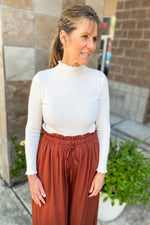 Ryan Knit Lettuce Hem Turtleneck Top White